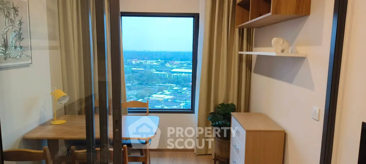 Charming study room with a view, featuring wooden furniture and elegant decor, perfect for productivity and relaxation.
