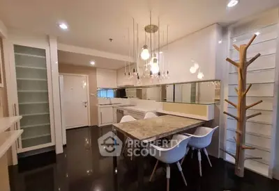 Modern kitchen with sleek design, open layout, and stylish lighting in a contemporary apartment.