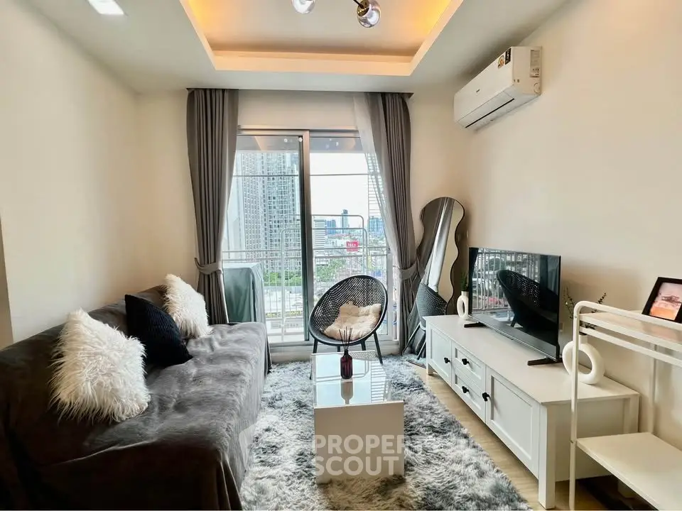 Modern living room with city view, cozy decor, and stylish furniture