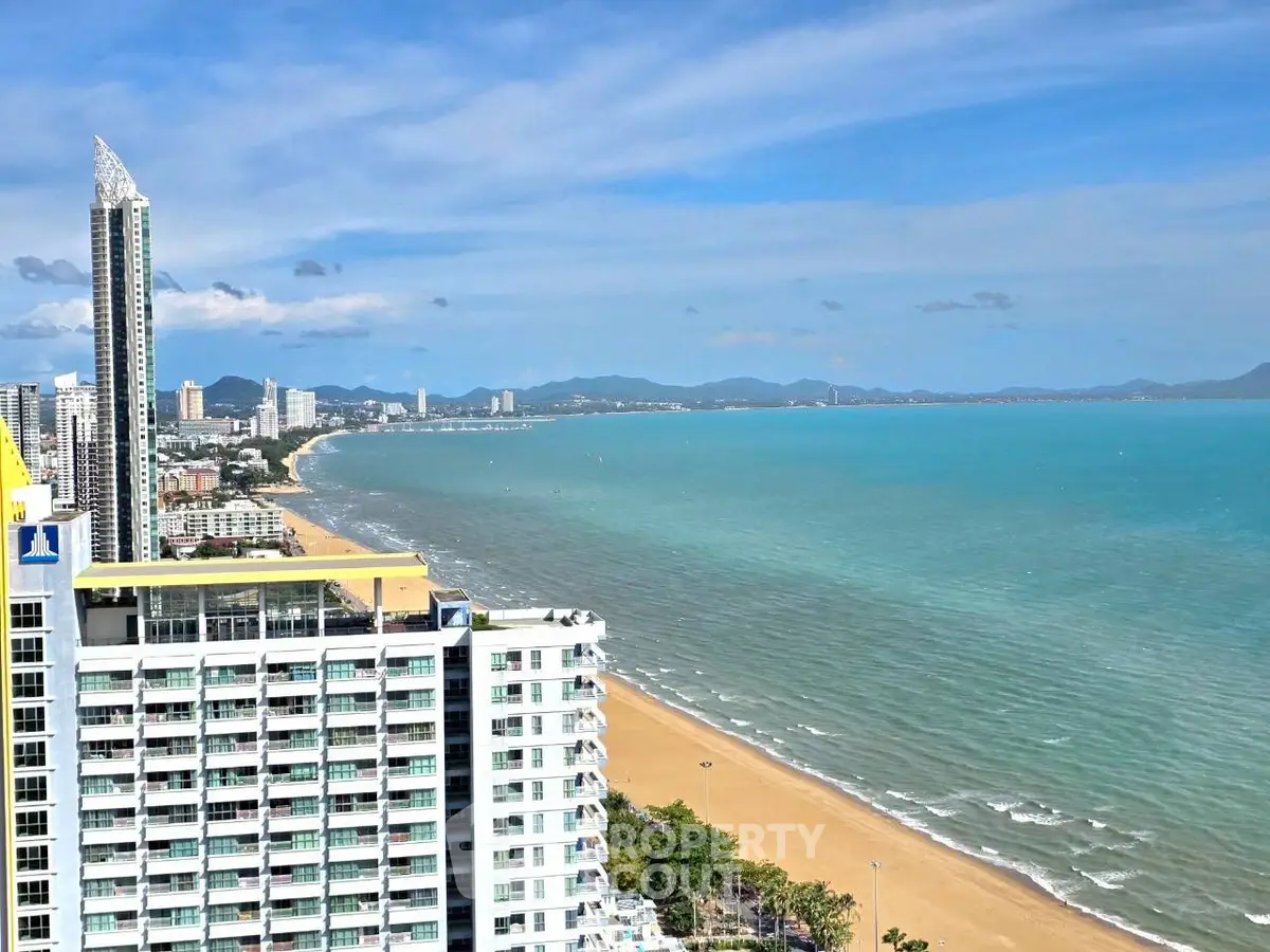 Stunning beachfront view from high-rise building with ocean and city skyline
