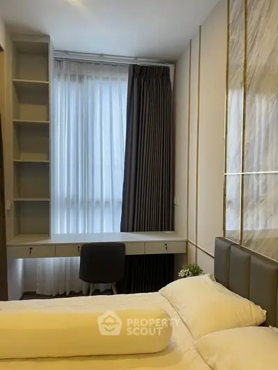 Modern bedroom with elegant decor and natural light