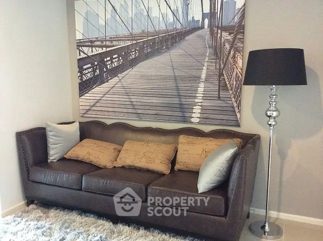 Stylish living room with leather sofa and modern decor