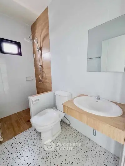 Modern bathroom with sleek fixtures and natural light