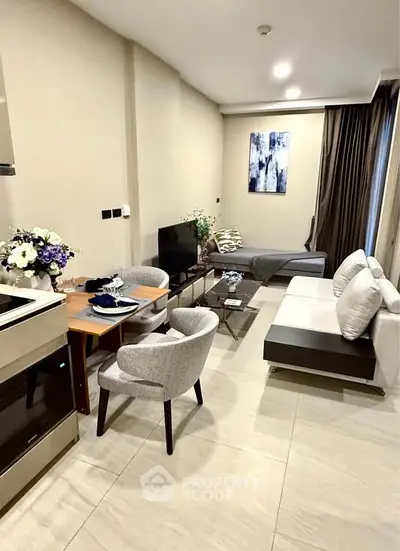 Modern living room with cozy seating and elegant decor