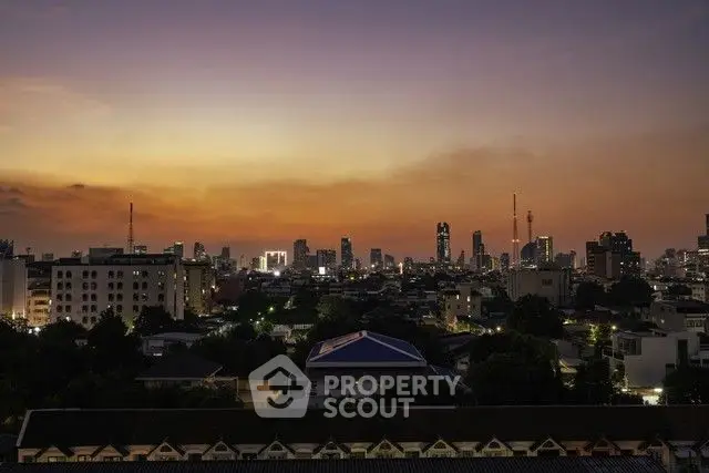 Stunning city skyline view at sunset with vibrant colors and urban landscape.