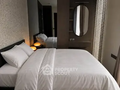 Luxurious modern bedroom with elegant decor and ambient lighting