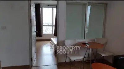 Cozy apartment interior with bedroom view and stylish dining area