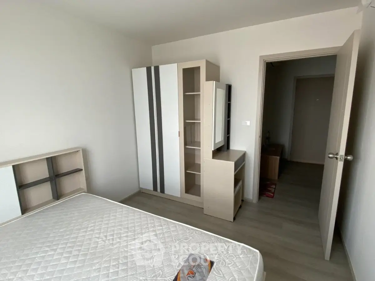 Modern bedroom with minimalist furniture and natural light