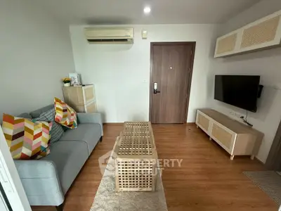 Cozy living room with modern decor and wooden flooring