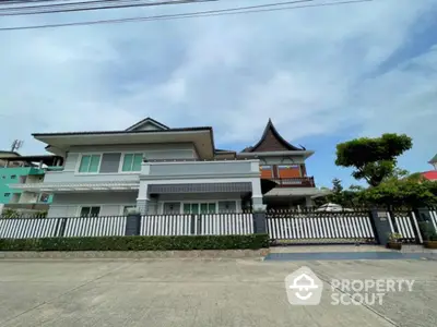 Stunning modern Thai-style house with unique architectural roof and spacious exterior