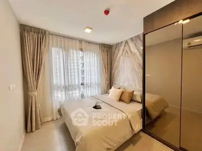 Luxurious bedroom with elegant decor and large window in modern apartment