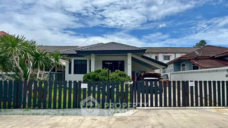 Charming suburban home with modern design and lush greenery, perfect for family living.