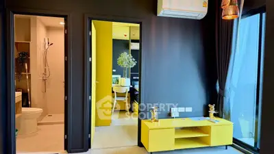 Modern apartment interior with vibrant yellow accents and sleek design