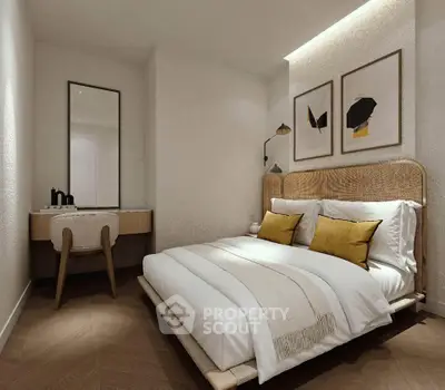 Elegant bedroom with modern decor, featuring a cozy bed, stylish artwork, and a chic vanity area.