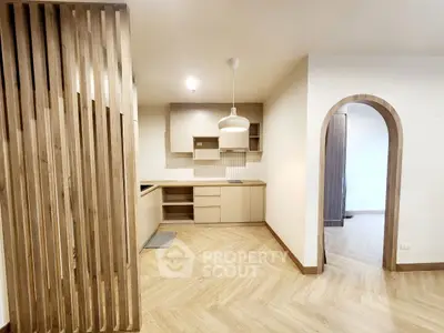 Modern kitchen with open layout and stylish wood accents