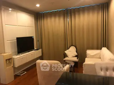 Cozy living room with elegant furniture and modern TV setup