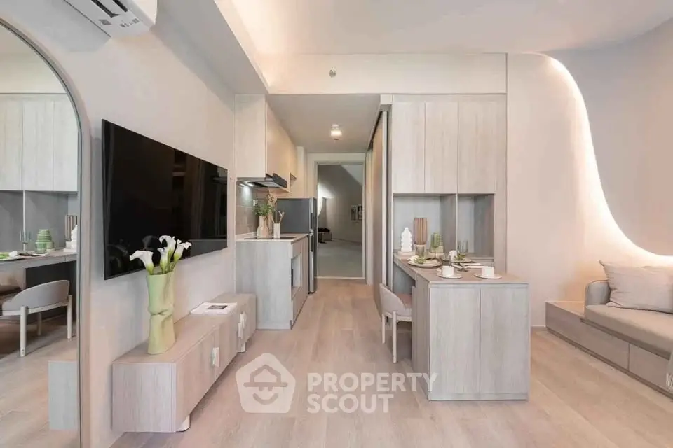 Modern living room with sleek design, open layout, and stylish furniture in a contemporary apartment.