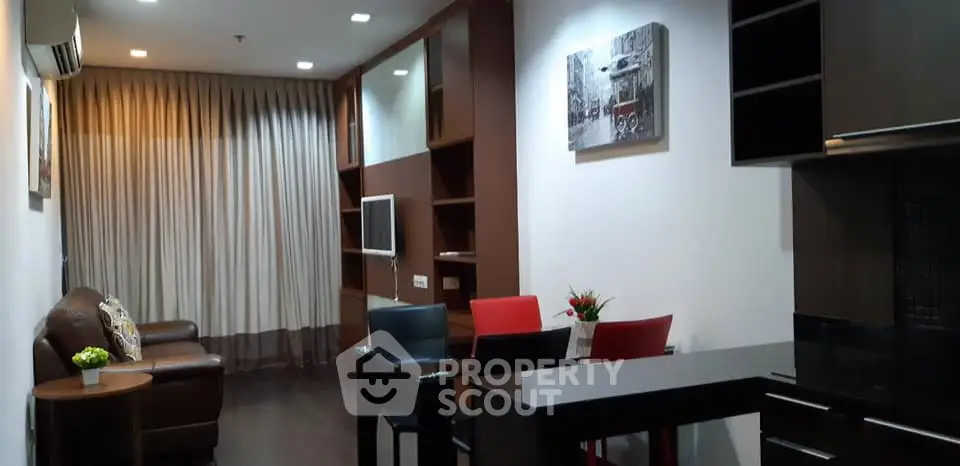 Modern living room with stylish furniture and open layout, perfect for cozy gatherings.
