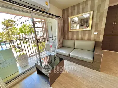 Modern living room with balcony view in stylish apartment