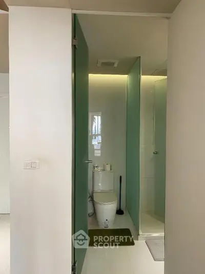 Modern bathroom with sleek design and glass shower enclosure