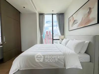Luxurious bedroom with stunning city view and elegant decor