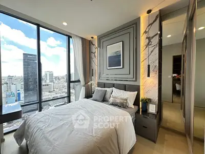 Luxurious bedroom with stunning city view and modern decor