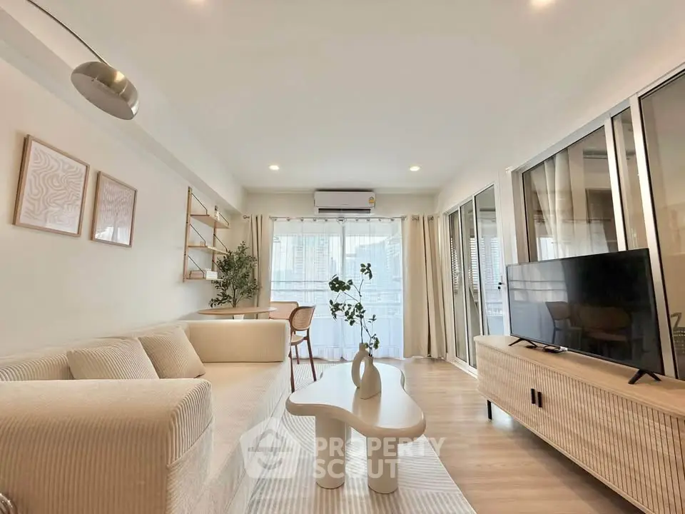 Spacious modern living room with elegant decor and natural light