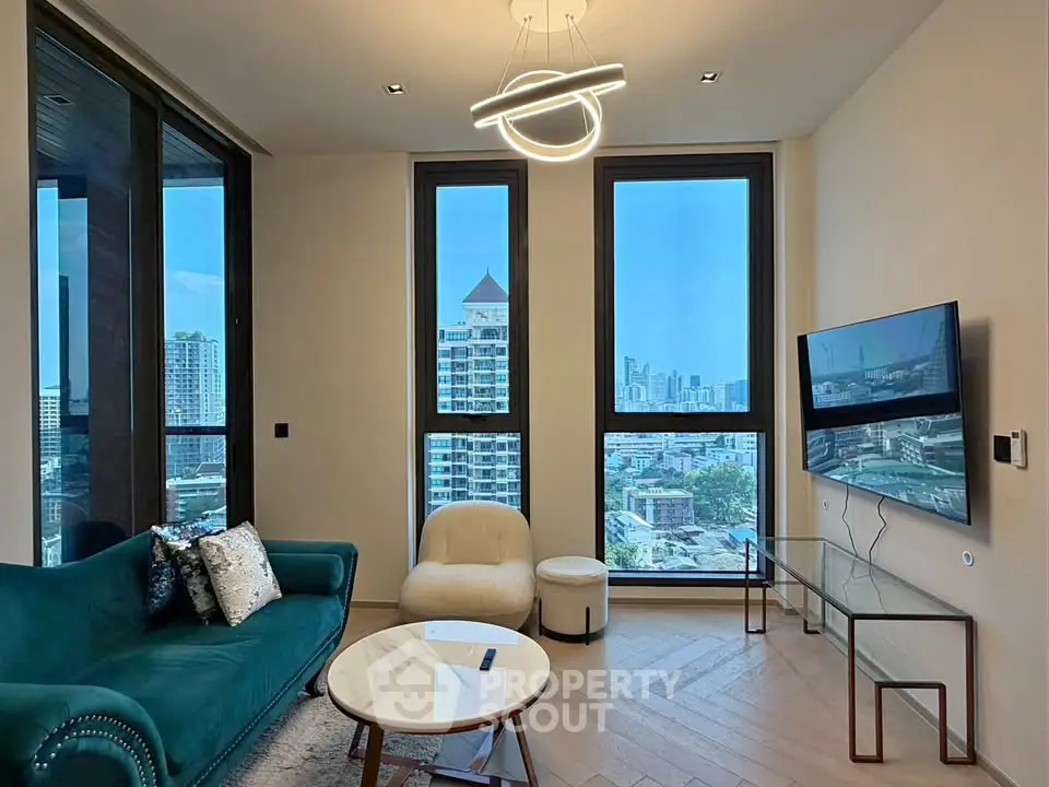 Modern living room with stunning city view, elegant furniture, and contemporary lighting.