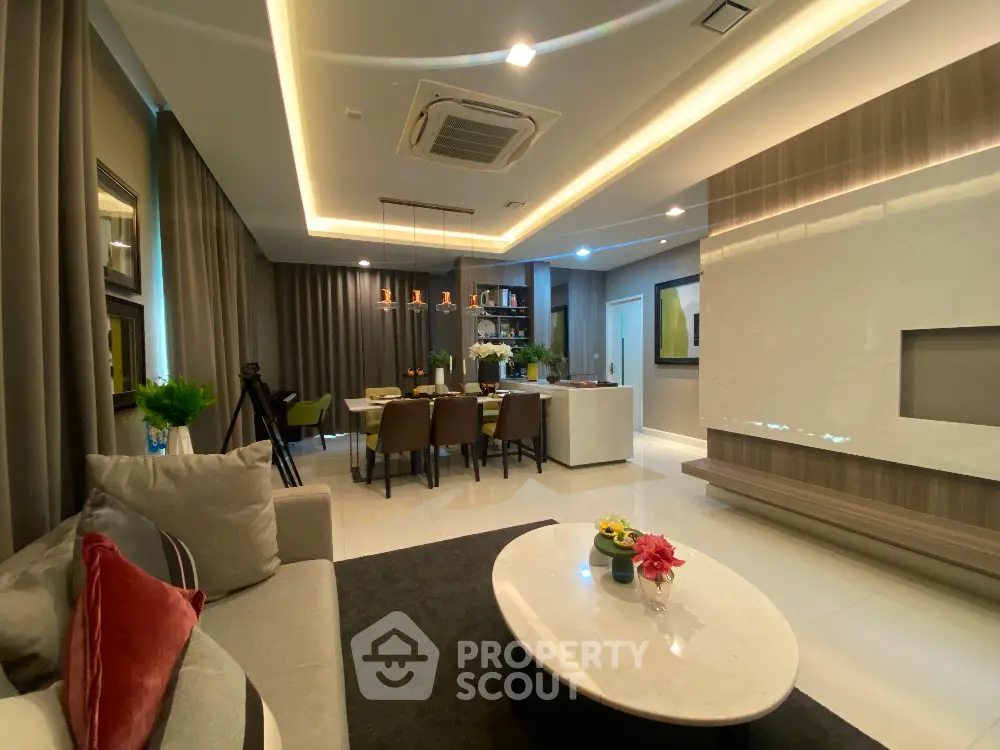 Luxurious modern living room with elegant dining area and stylish decor
