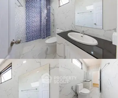 Modern bathroom with elegant marble tiles and sleek fixtures