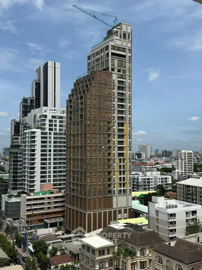 Stunning high-rise building with modern architecture and cityscape views, perfect for urban living.