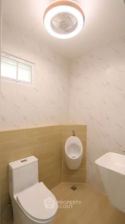 Modern bathroom with sleek fixtures and stylish tile design