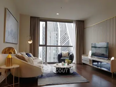 Luxurious living room with modern decor and stunning city view.