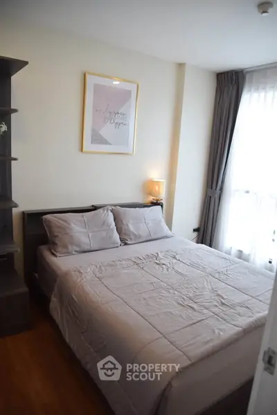 Cozy bedroom with modern decor and natural light
