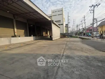 Spacious industrial loading dock with ample parking and easy access.
