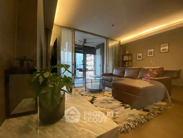 Luxurious modern living room with elegant decor and spacious seating area.