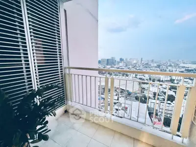 Stunning high-rise balcony with panoramic city views, perfect for urban living enthusiasts.