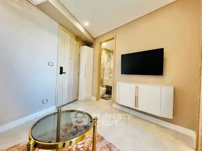 Modern living room with wall-mounted TV and elegant decor
