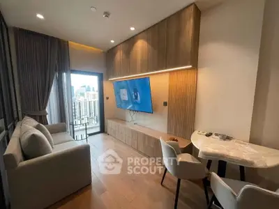 Modern living room with city view, featuring sleek furniture and stylish decor.