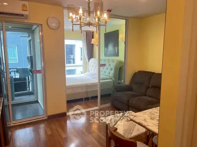 Cozy living room with adjacent bedroom in modern apartment