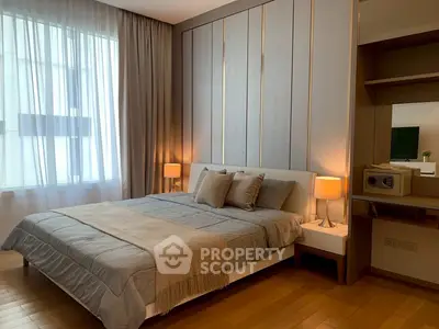Luxurious bedroom with elegant decor and ambient lighting, perfect for relaxation.