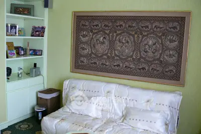 Cozy living room with decorative wall art and built-in shelving