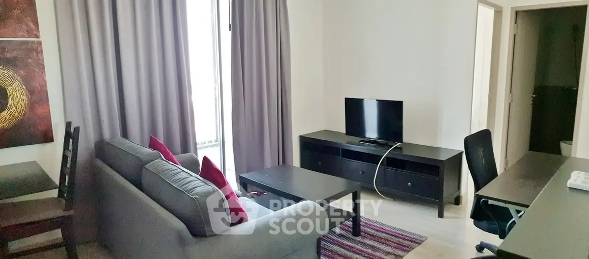 Modern living room with sleek furniture and natural light