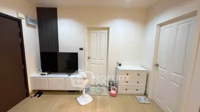 Modern living room with sleek TV setup and minimalist decor