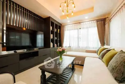 Luxurious living room with elegant decor and ample natural light
