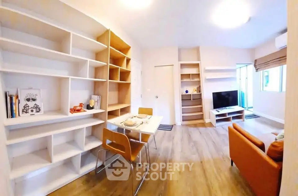 Modern living room with open layout, stylish furniture, and natural light, perfect for cozy gatherings.