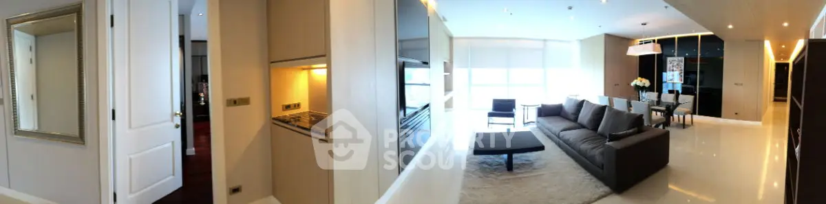 Luxurious open-plan living room with modern decor and dining area