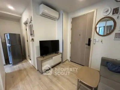 Modern apartment living room with air conditioning and sleek decor