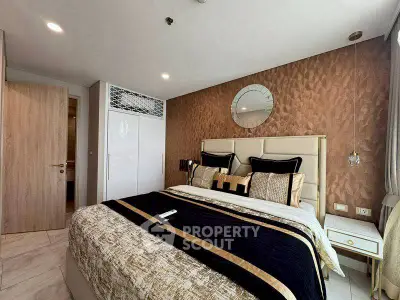 Luxurious bedroom with elegant decor and stylish bedding in modern apartment