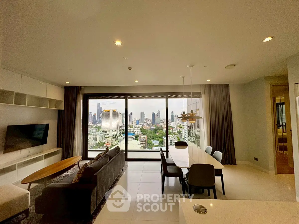 Spacious modern living room with stunning city view and elegant dining area